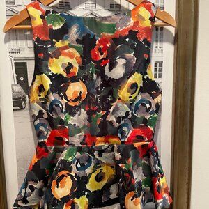 Excellent Condition Alice + Olivia crew neck peplum fitted top with back zip S